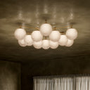 Elegant Orion Round Chandelier - Burnished Brass Marbled Matte Glass